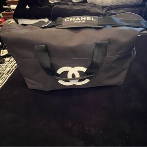 CHANEL Black Duffel Bag with White Logo